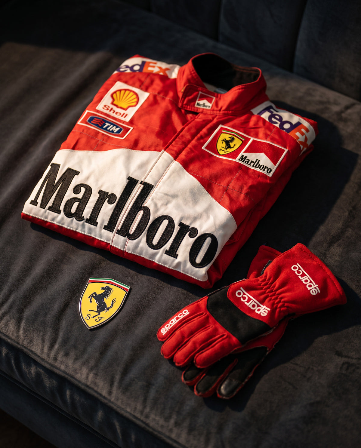 Formula 1 race suit and racing gloves, sports memorabilia valuation